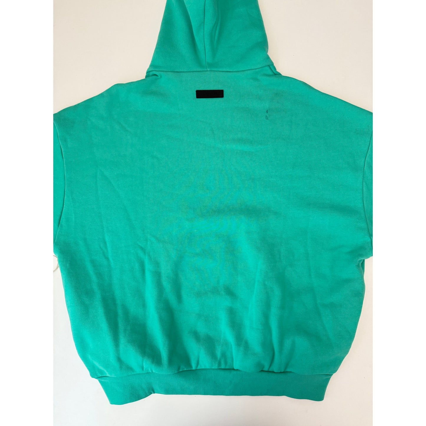 Fear of God Essentials teal hoodie - size large