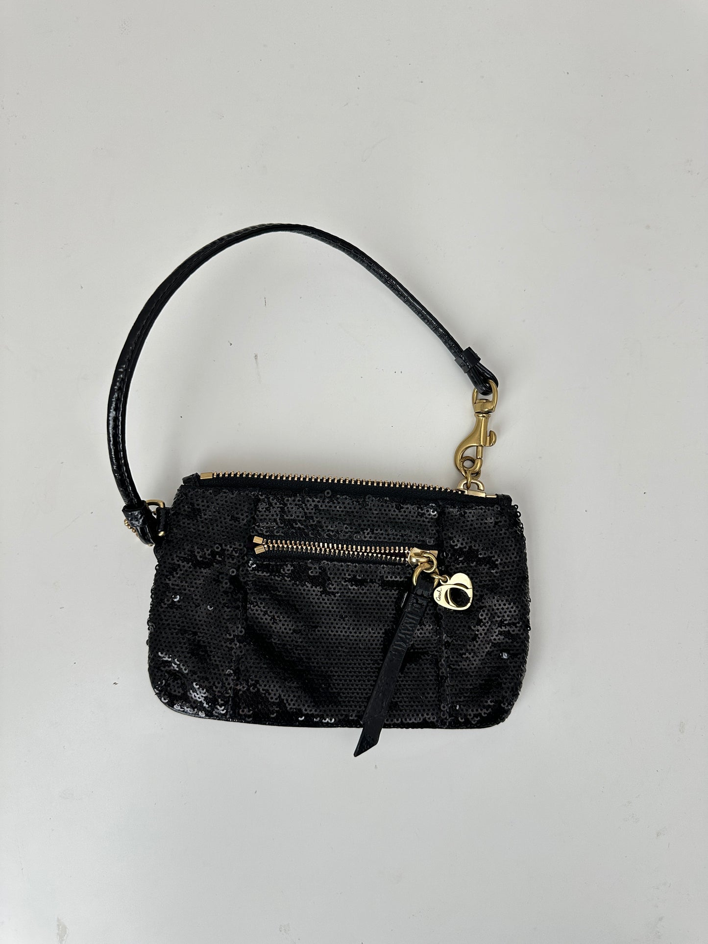 coach poppy sequin wristlet - black and gold