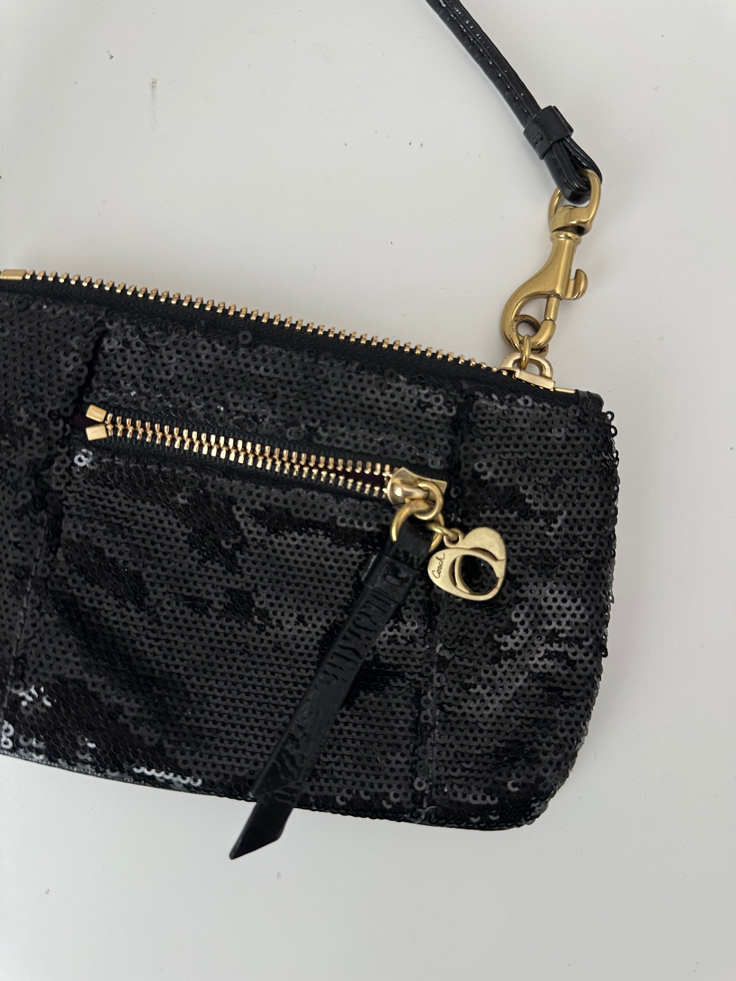 coach poppy sequin wristlet - black and gold