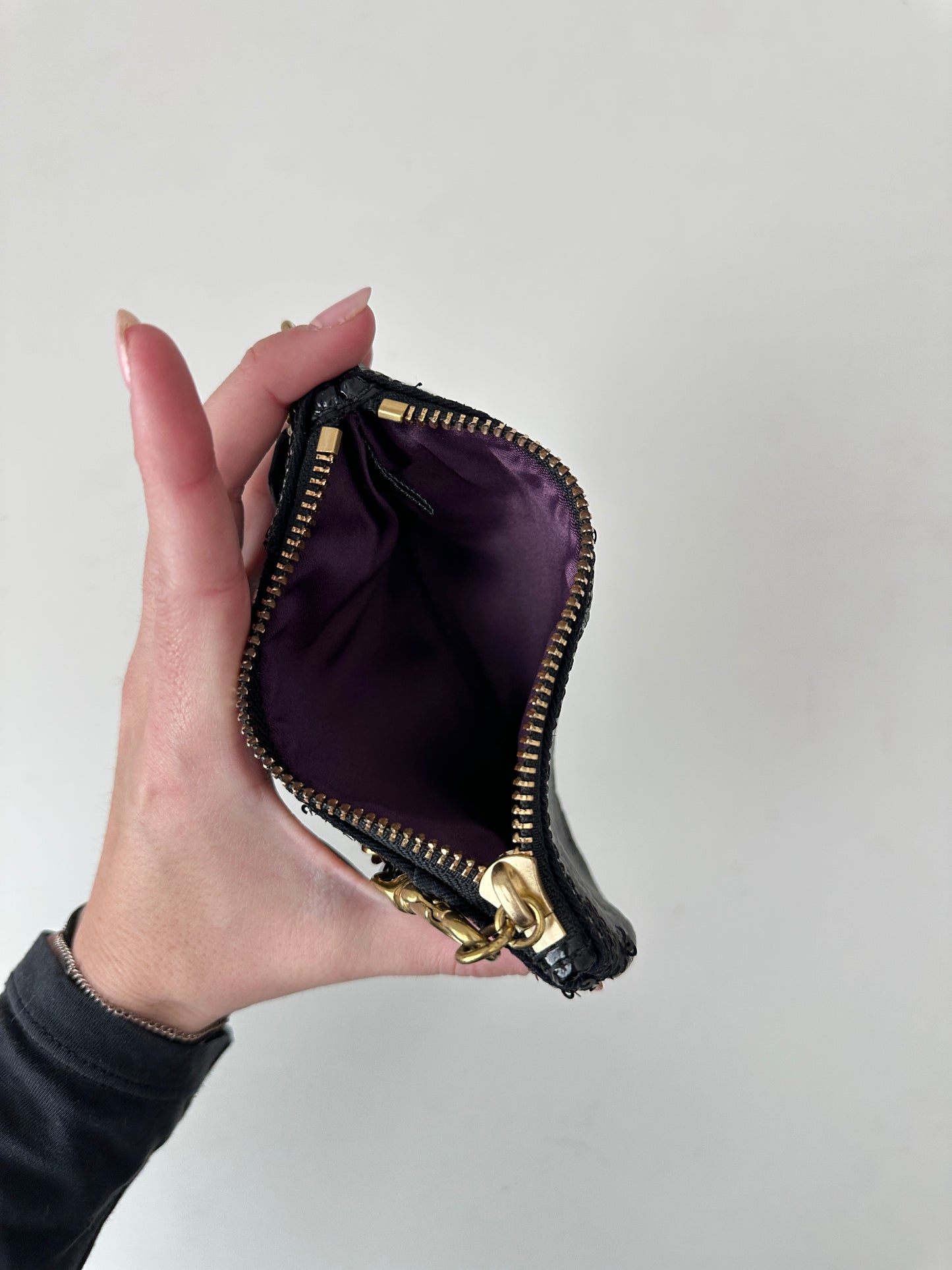 coach poppy sequin wristlet - black and gold