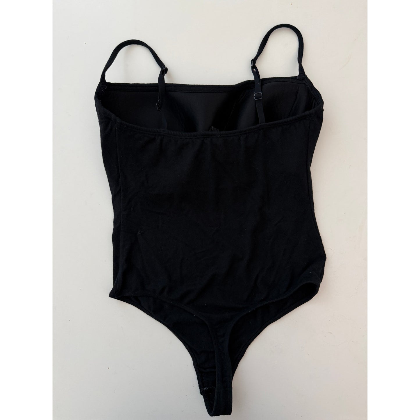 skims black bodysuit with built in bra - size small