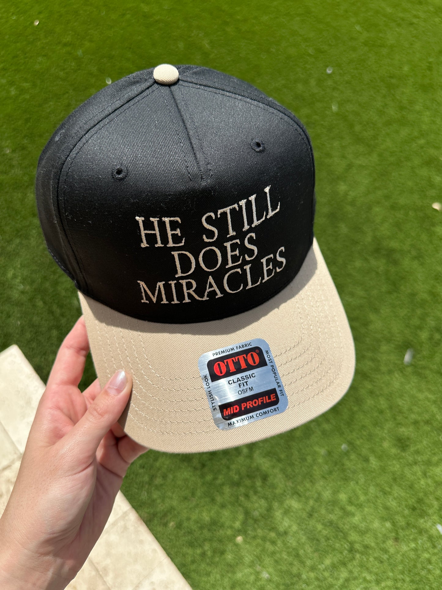 he still does miracles embroidered trucker hat