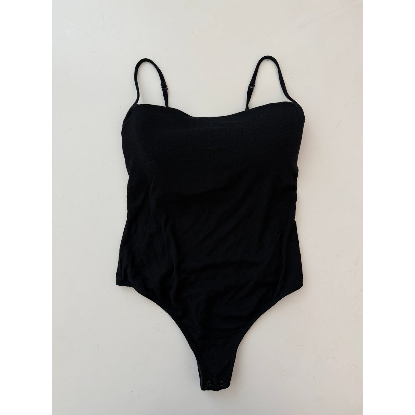 skims black bodysuit with built in bra - size small